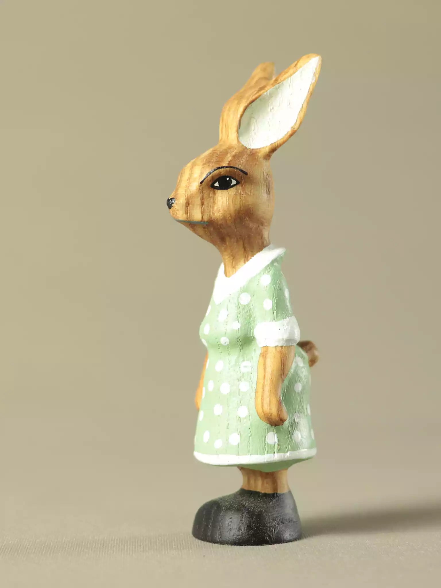 Hand painted wooden rabbit lady in green dress