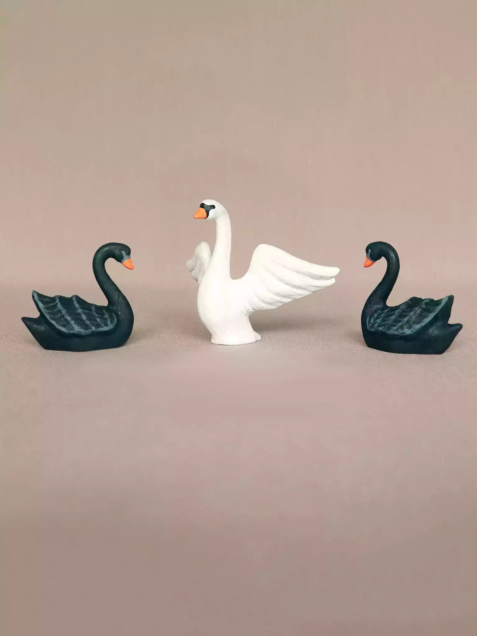 Black and white wooden swans