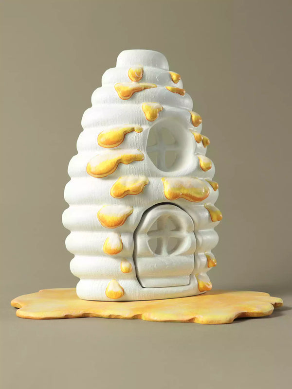 Hand painted wooden beehive house with honey drip details
