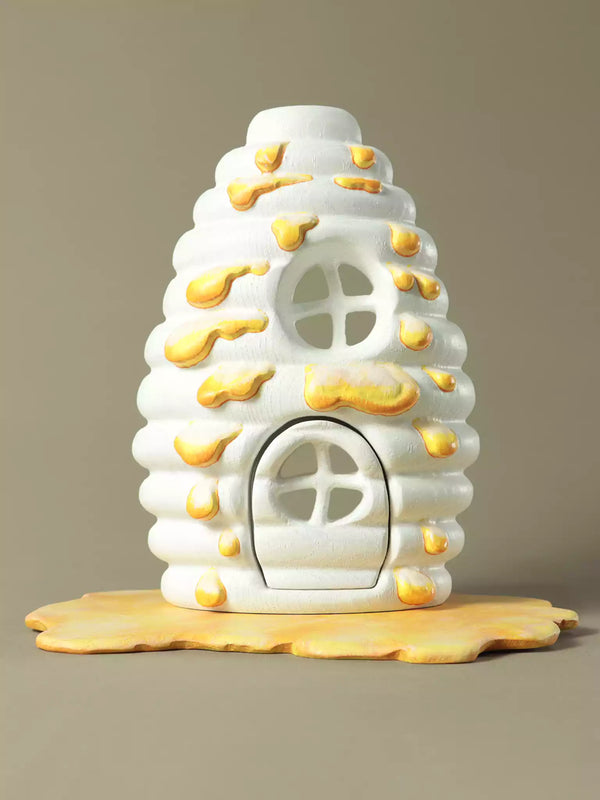 Handcrafted woodland beehive house with smooth finish