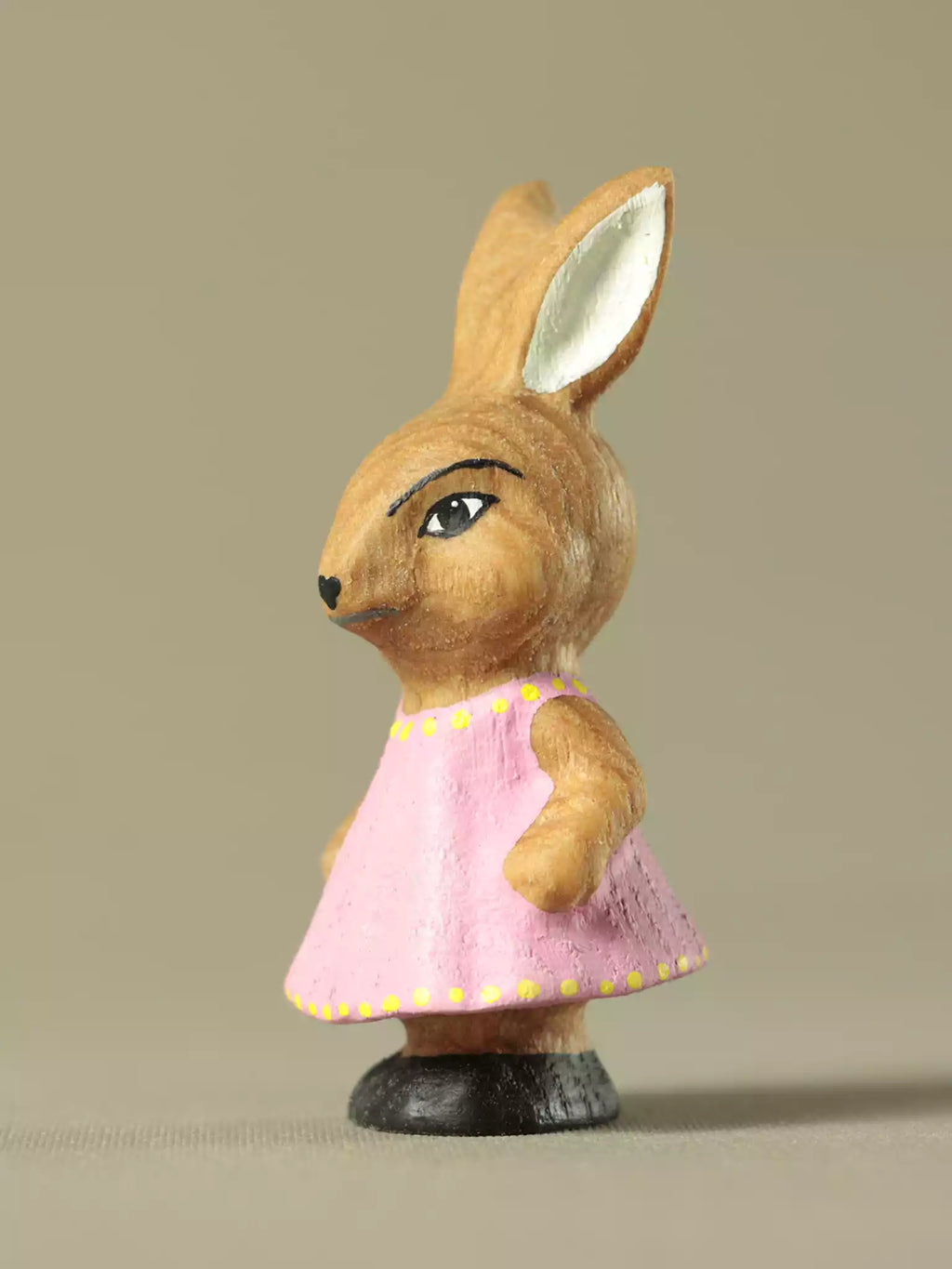 Wooden rabbit girl toy in pink dress
