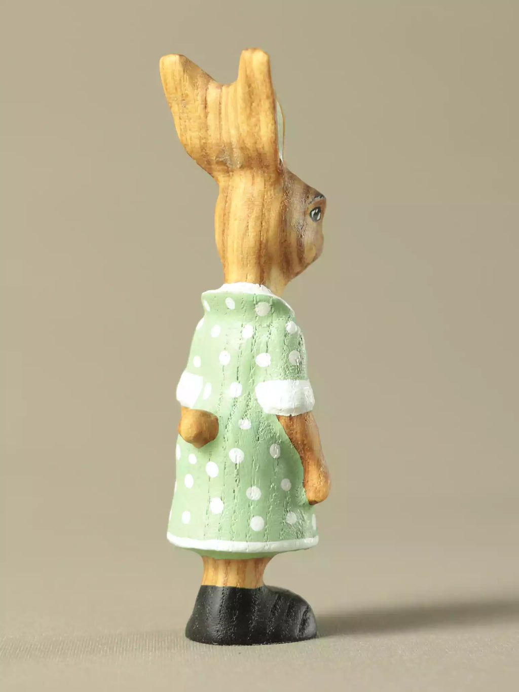 Wooden bunny figurine with green polka dot dress EN71 compliant