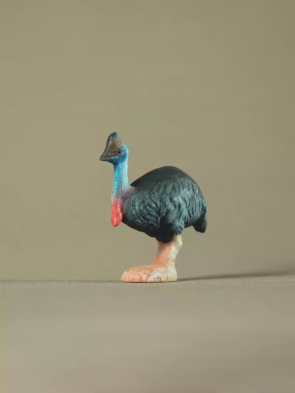 Hand-painted wooden cassowary toy with blue neck and black body, eco-friendly Montessori and Waldorf-inspired figure.