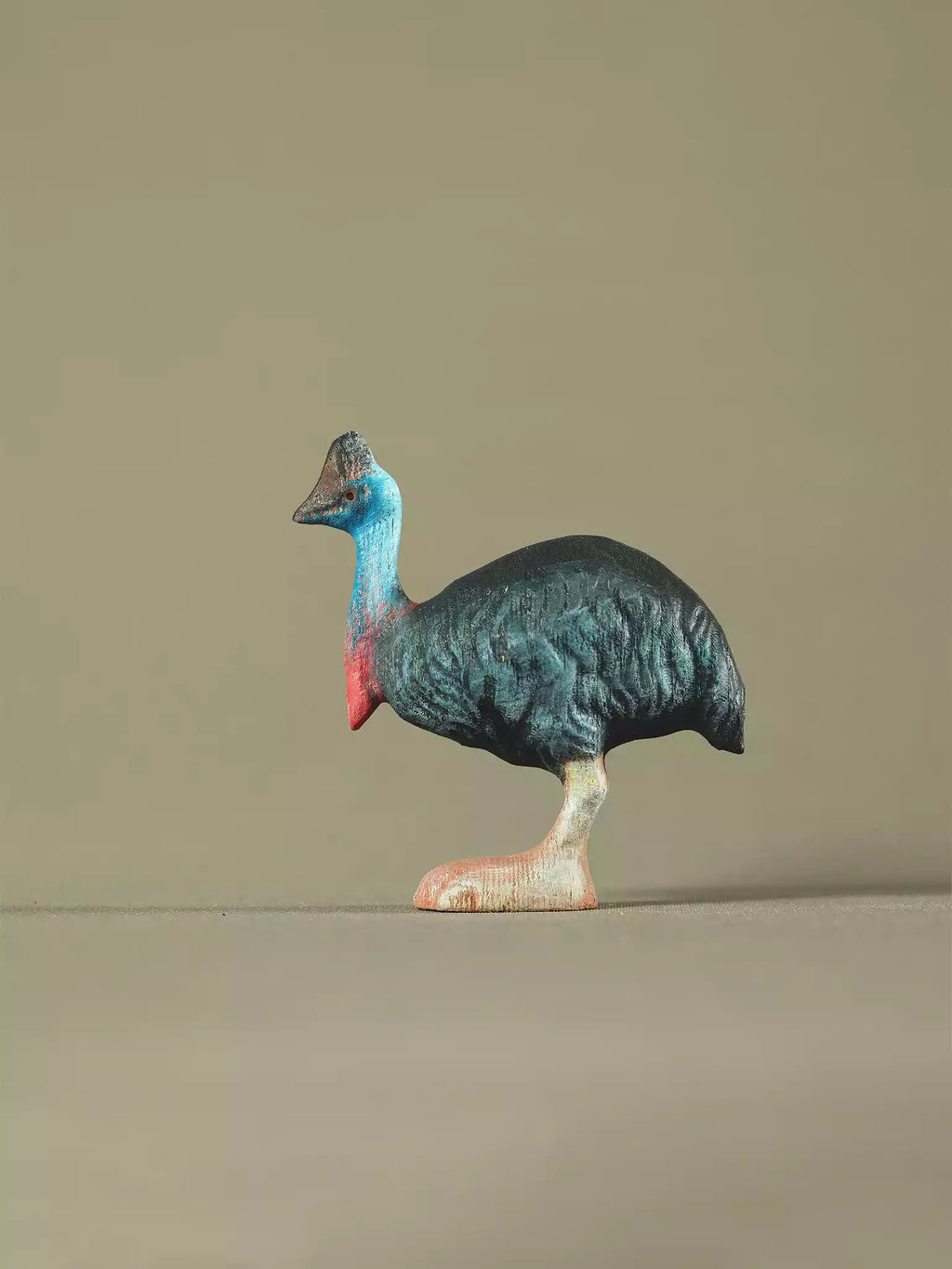 Eco-friendly cassowary wooden figurine crafted for Montessori and Waldorf-inspired education.