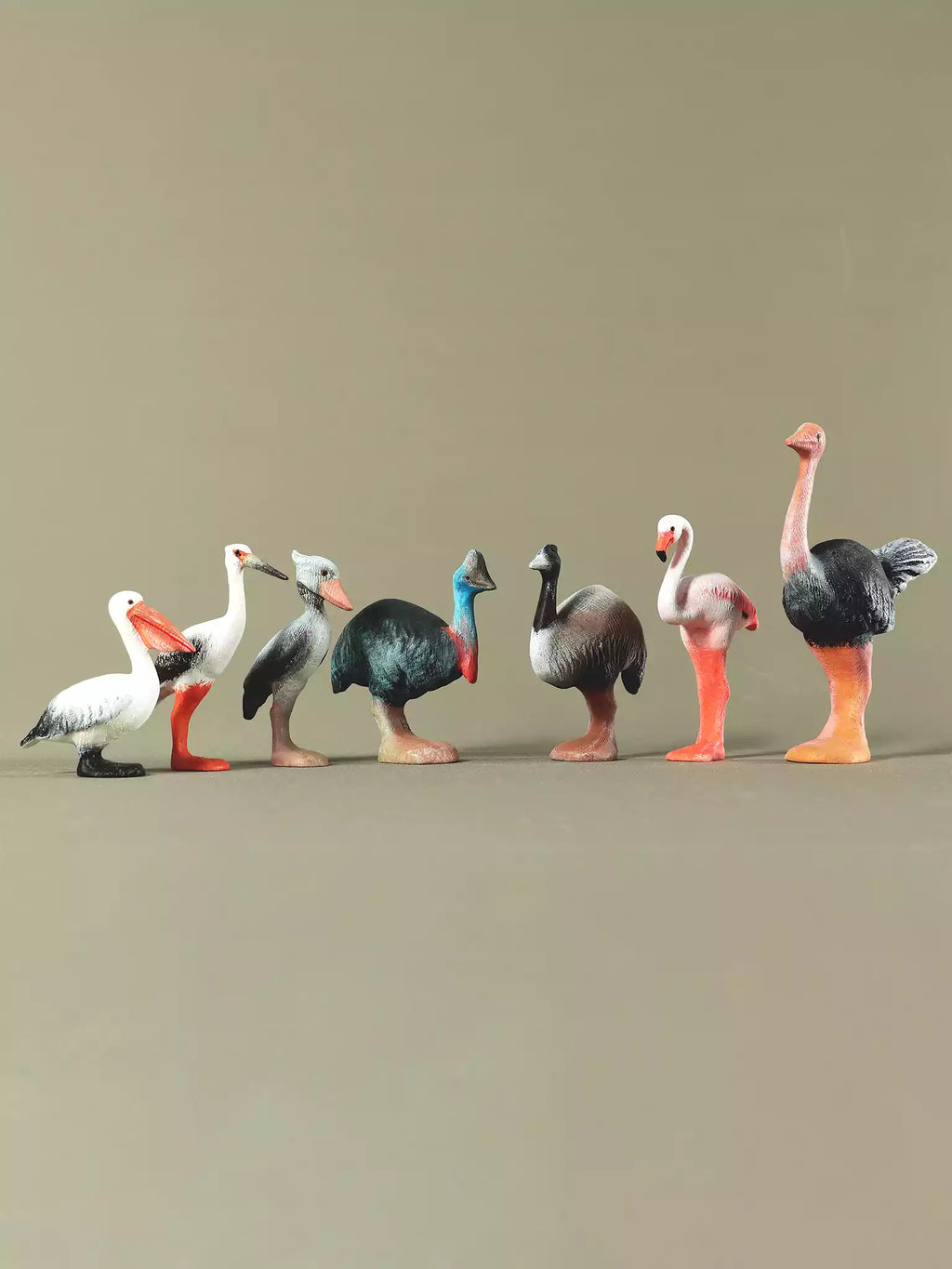 Large bird wooden toy series arranged against neutral background for educational and collectible use.