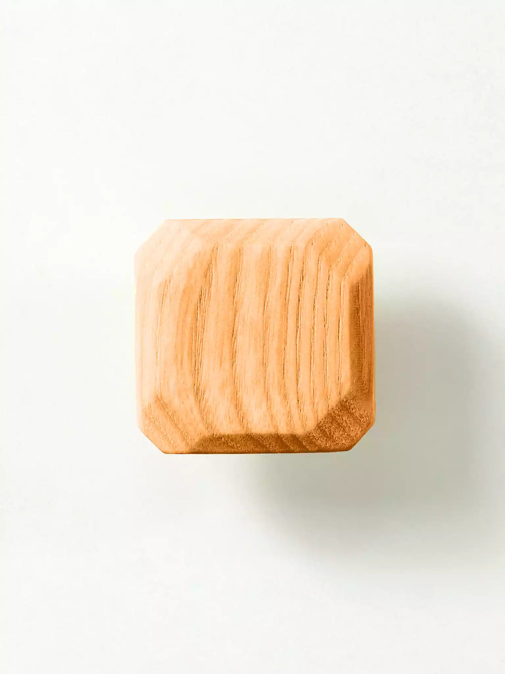 Natural solid wood pull handle isolated on white background

