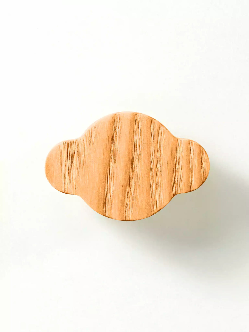 Light-toned solid wood handle for modern cabinetry