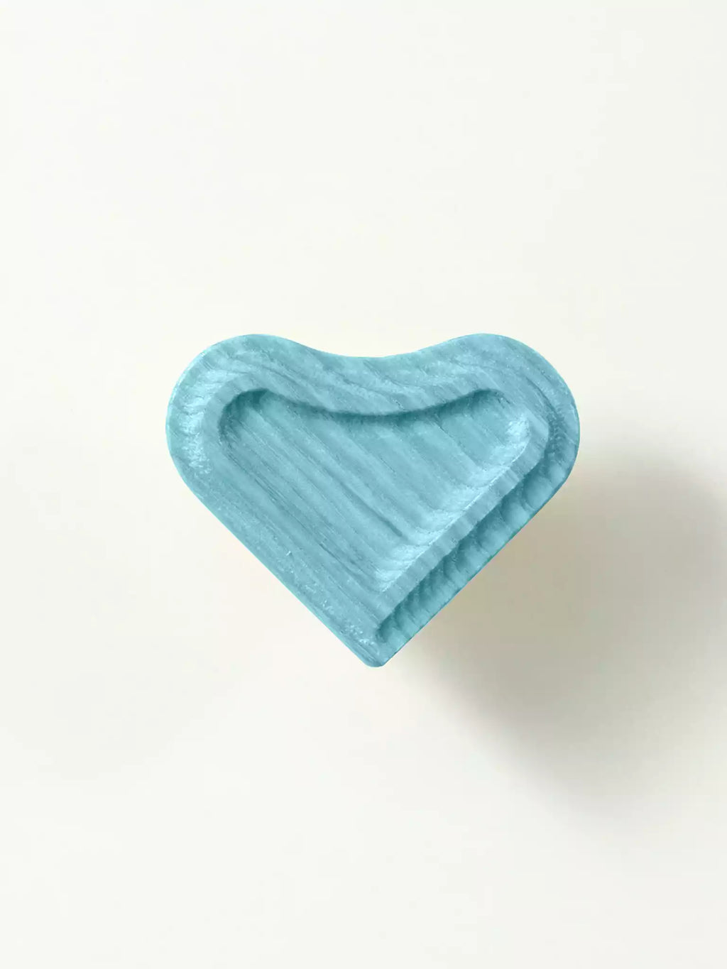 Heart-shaped wooden dresser knob with natural wood grain