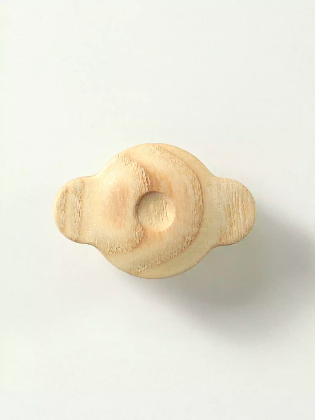 Wooden pull handle on a white background