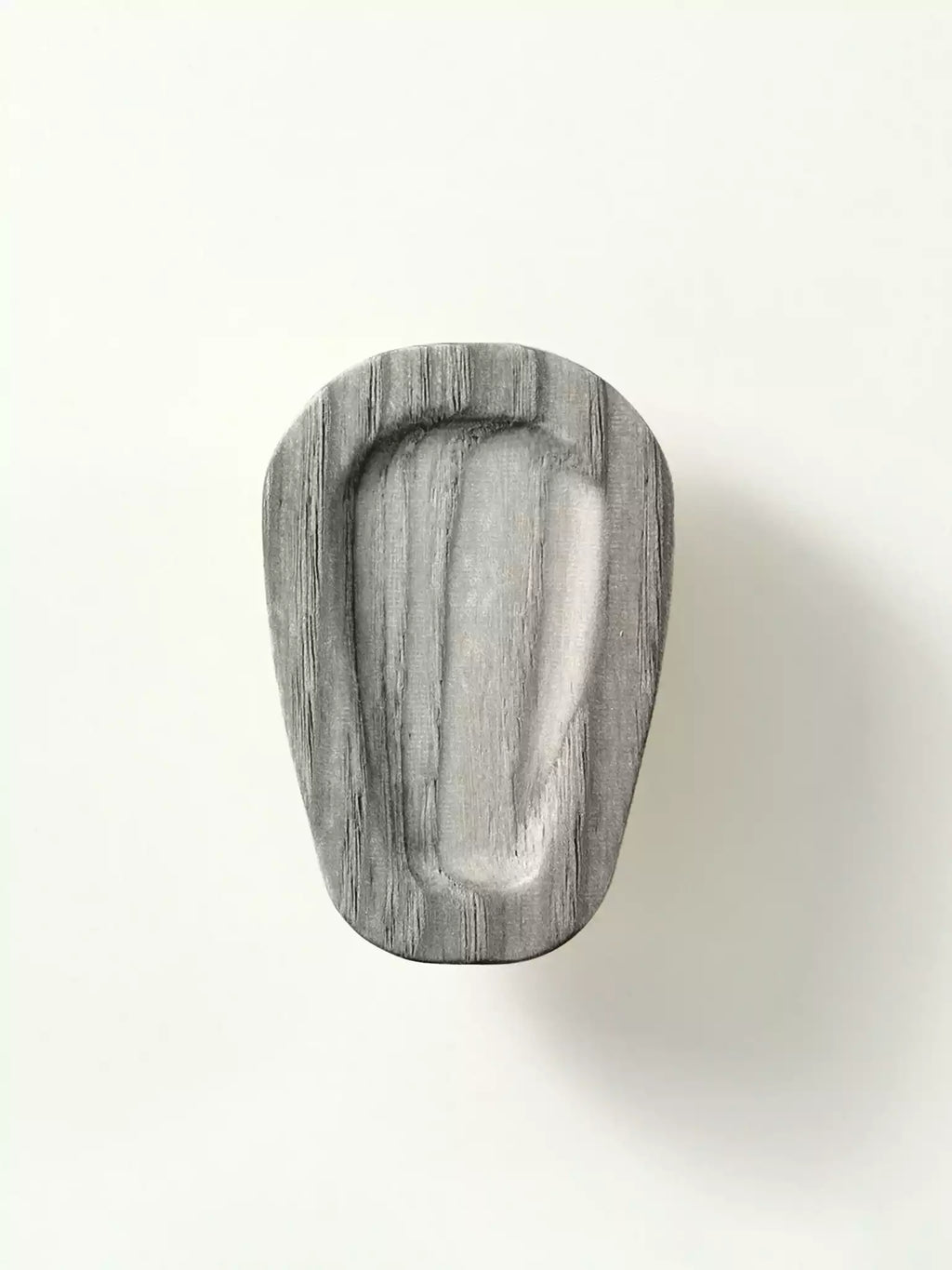 Wooden drawer pull with a grayish-brown finish on a white background