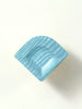 Blue rectangular knob on a white background