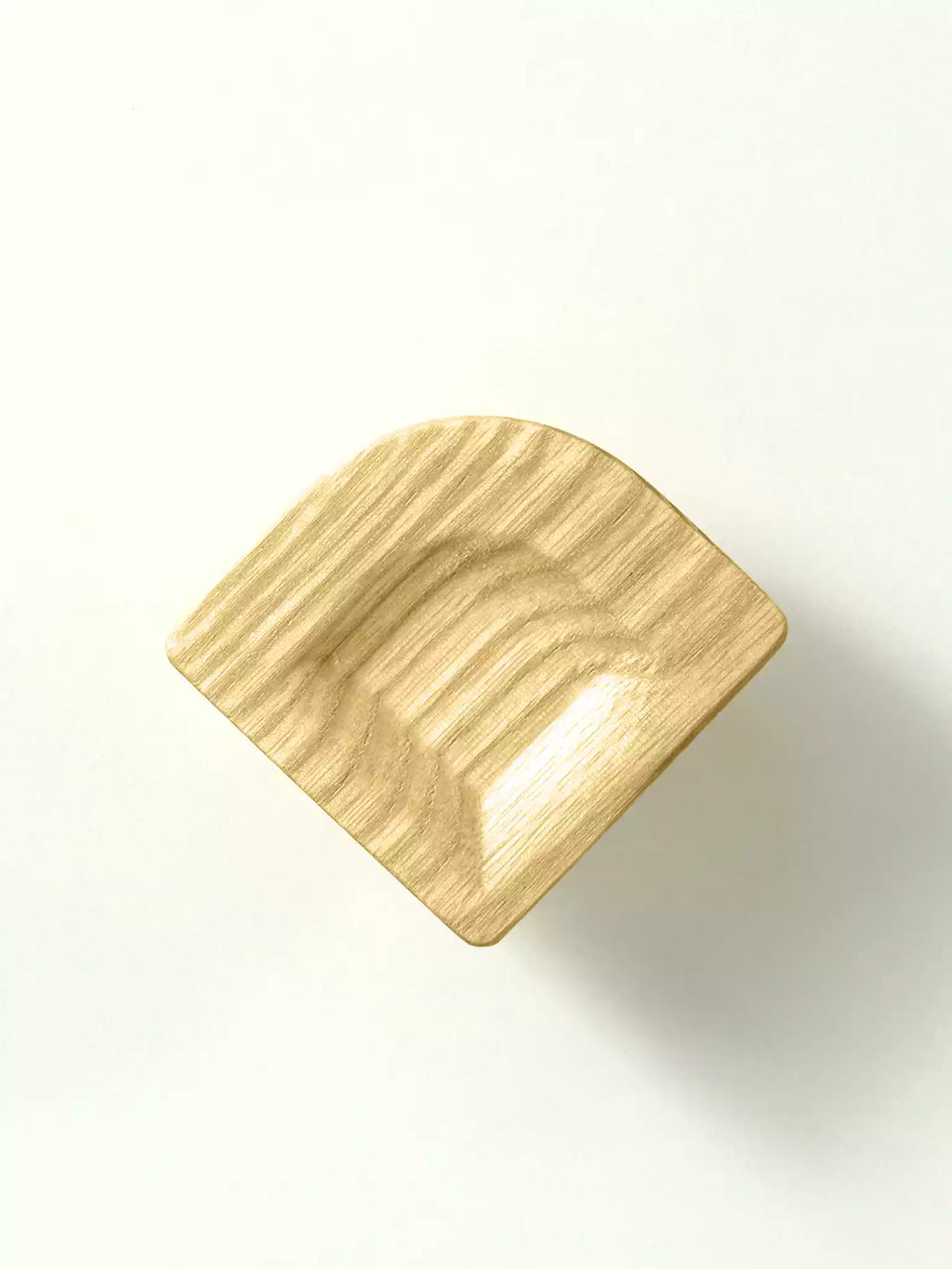 Wooden pulls, designed for cupboards on a white background