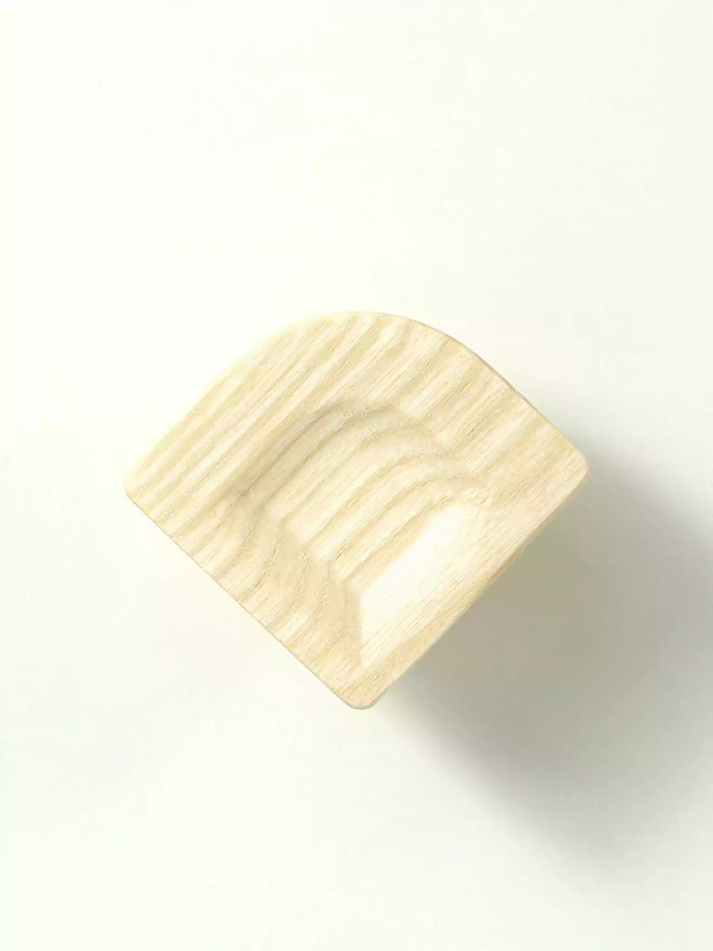 Wooden furniture handle on a white background