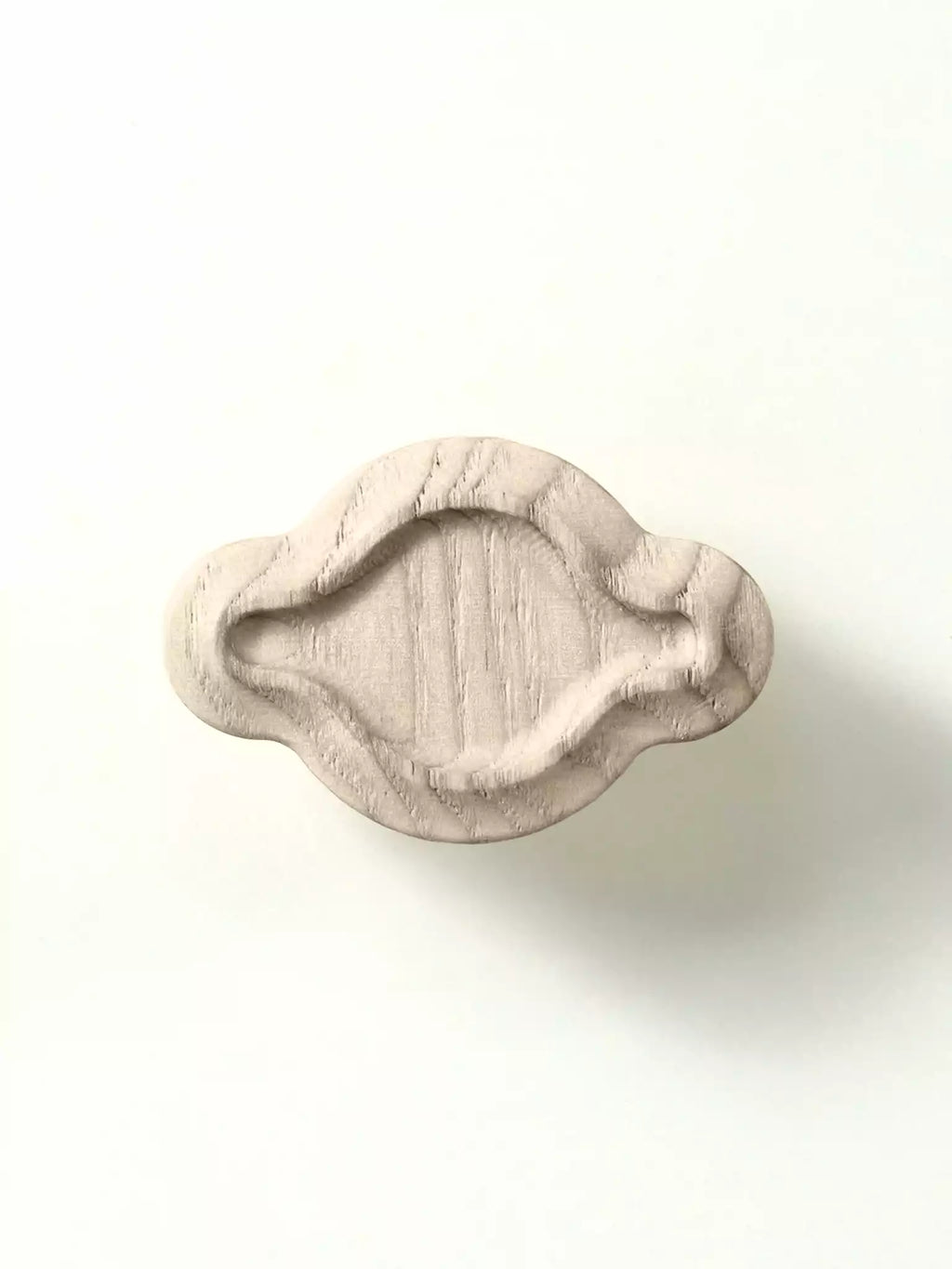 Wooden handle on a white background