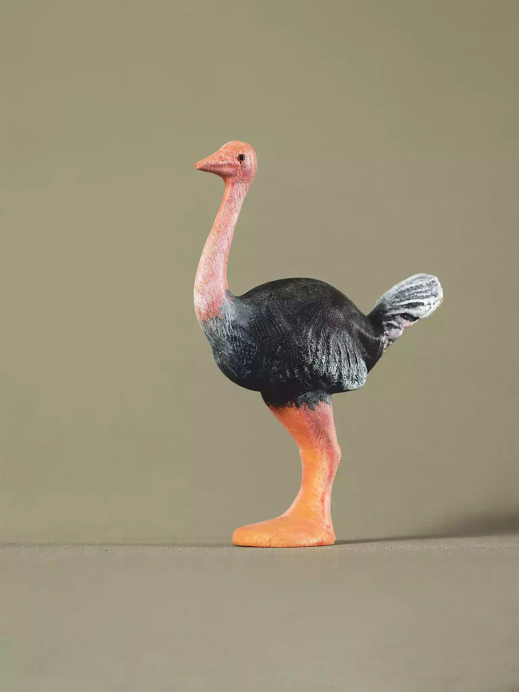 Realistic ostrich wooden toy for Montessori and Waldorf-inspired learning activities.