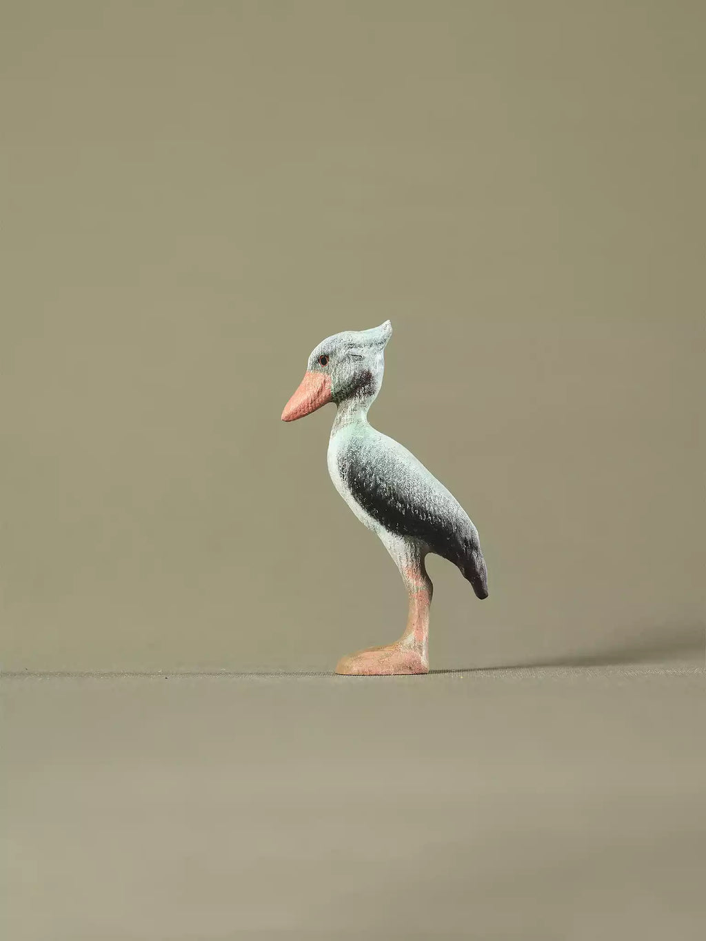 Eco-friendly wooden shoebill collectible with hand-painted details for educational play.