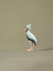 Non-toxic painted wooden shoebill bird figure for sustainable playrooms.