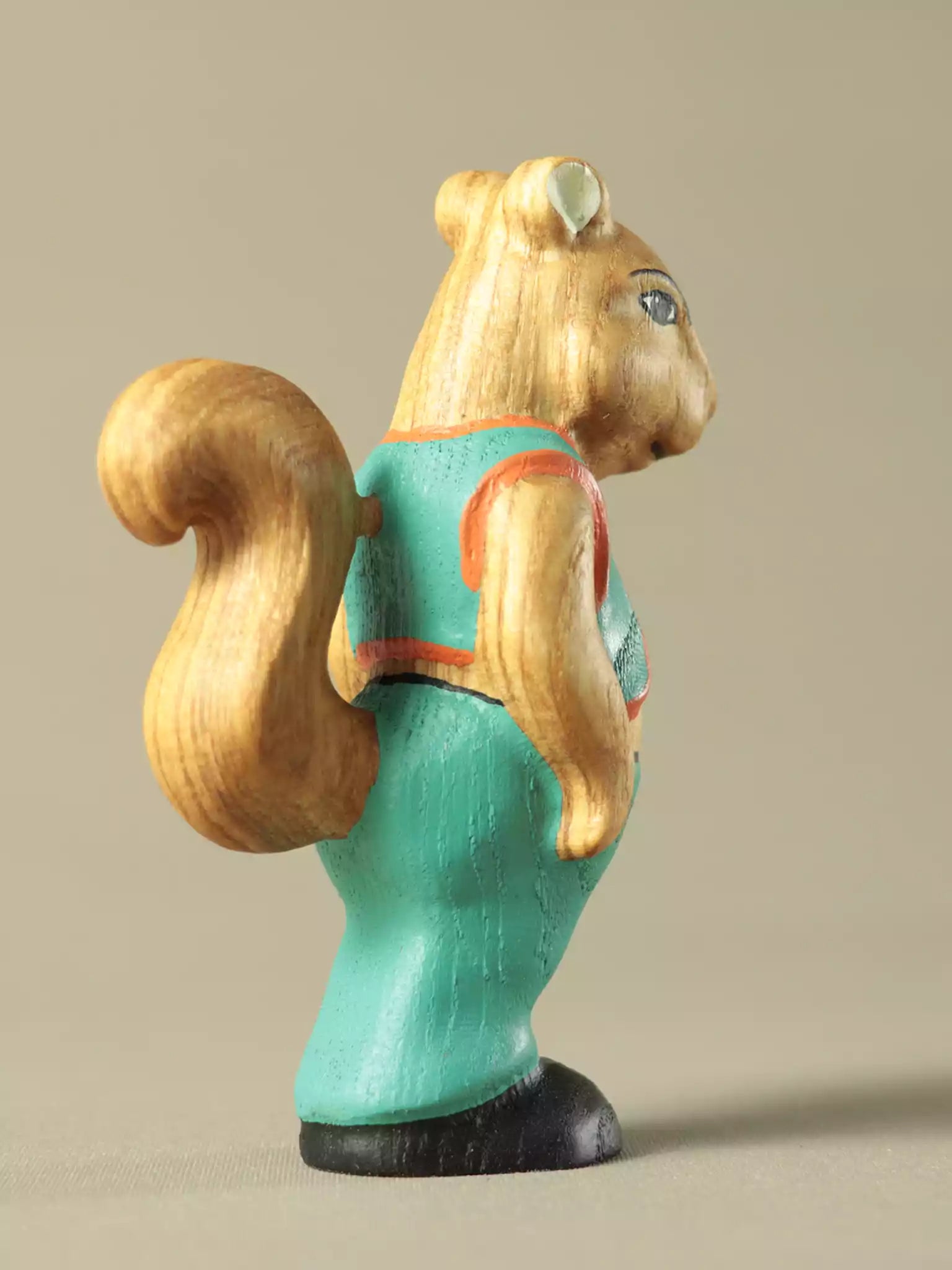 Montessori wooden squirrel figurine with natural wood grain