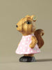 Wooden squirrel girl toy wearing pink dress with white dots