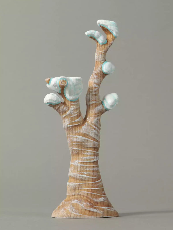 Wooden oak tree branch with snow on a gray background