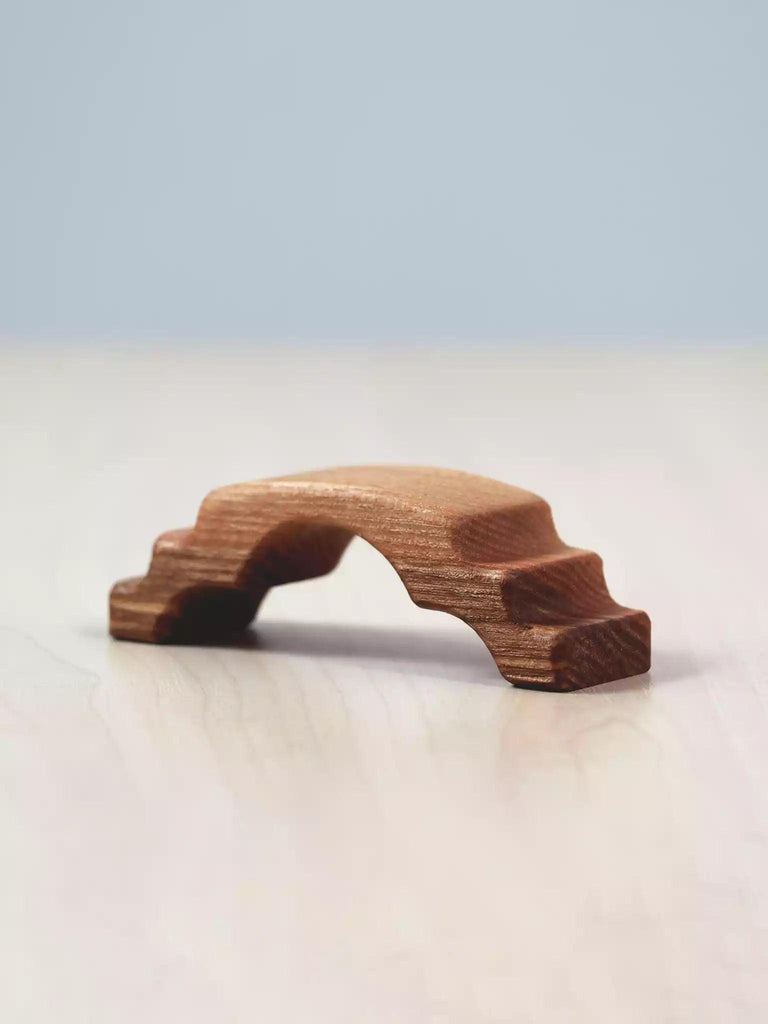 Wooden top bridge toy